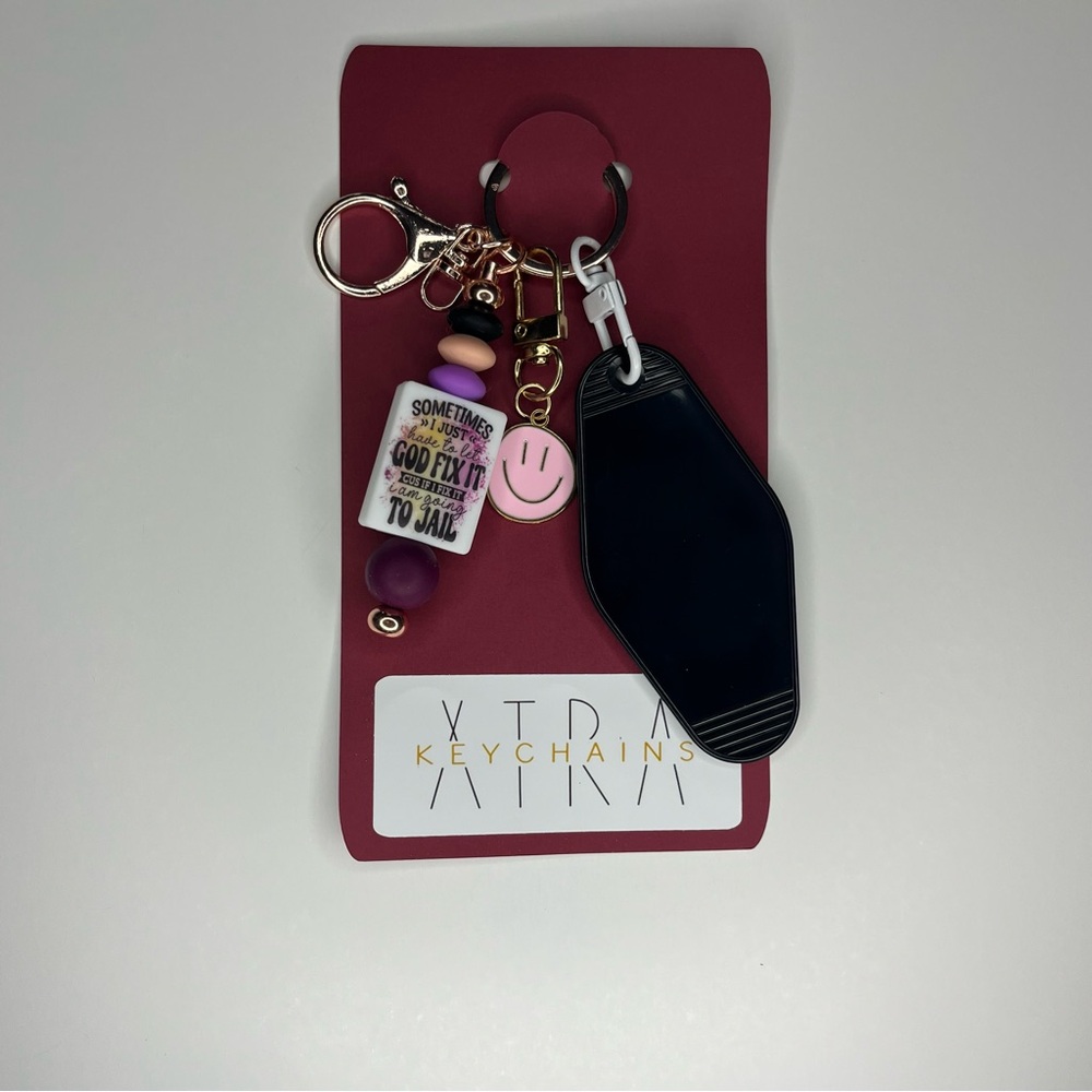Black Motel Tag and Pink Smiley Keychain Set